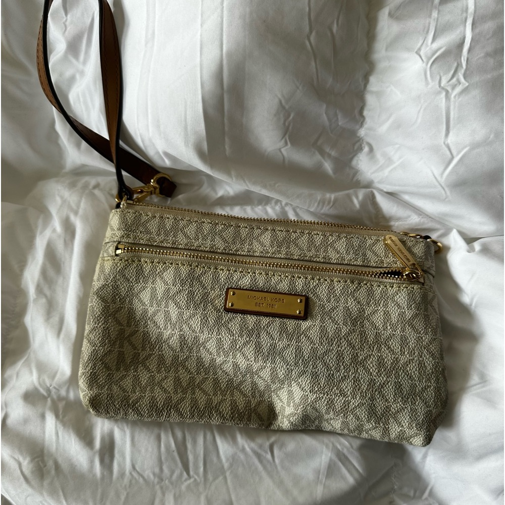 Michael Kors wristlet MK symbols